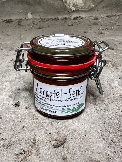 Zierapfel Senf im ganzen Korn in dem Bügelglas. 