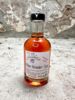 Mohn Holunderblüten Sirup in der Glasflasche mit Schraubverschluss.